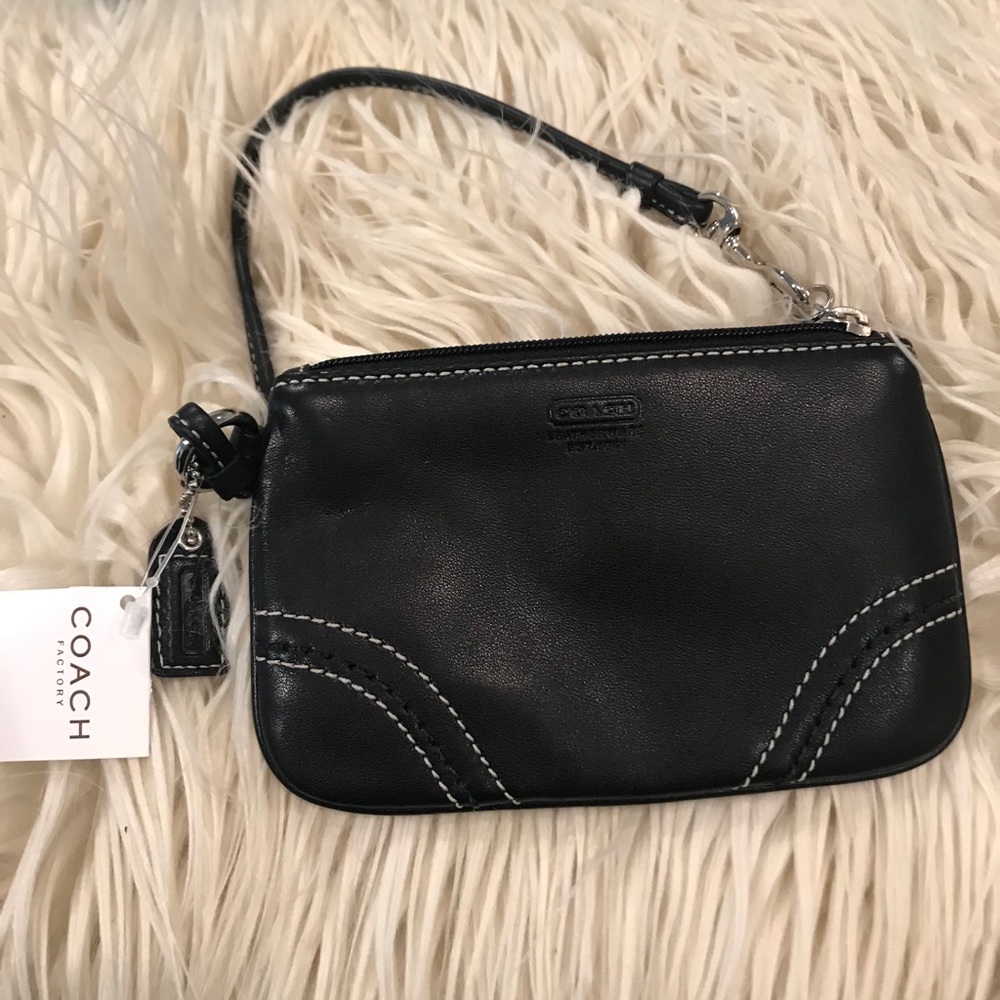 Coach wristlet with dust bag.